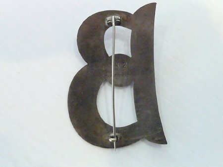 Marching hat badge - reverse